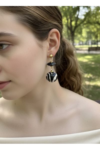 BOUCLES D'OREILLES EN ACIER...